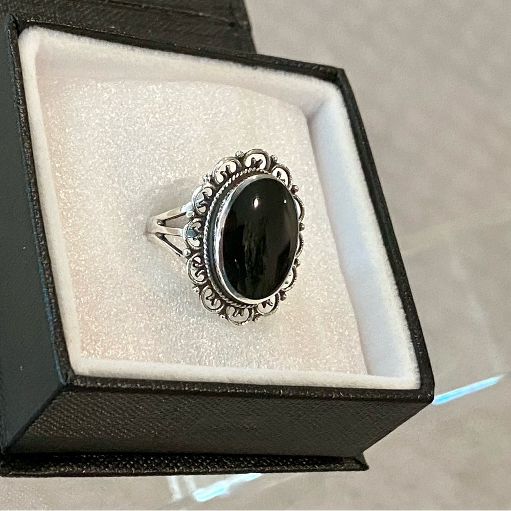 Brand new classic design sterling silver ring with onyx.